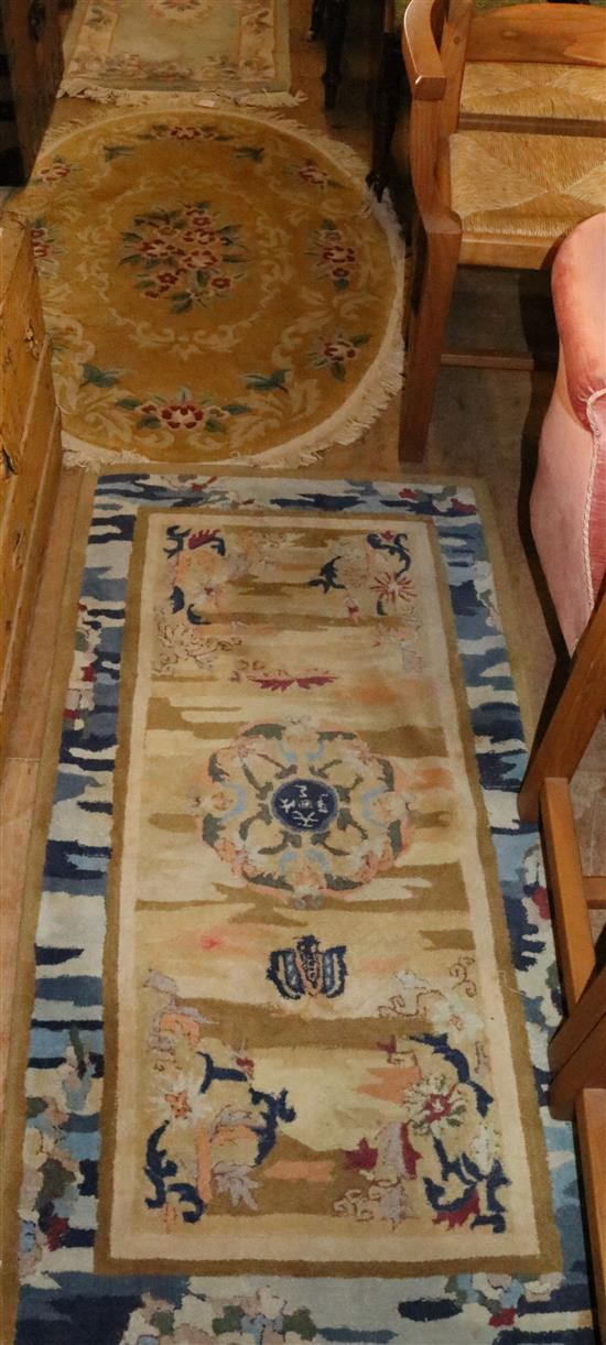 Four small Chinese rugs